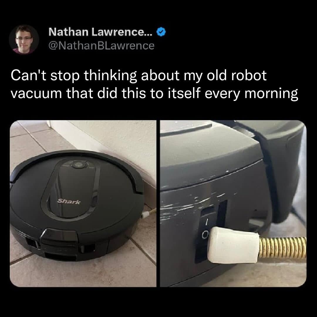 Robot vacuum stuck under furniture switching itself off in defeat.