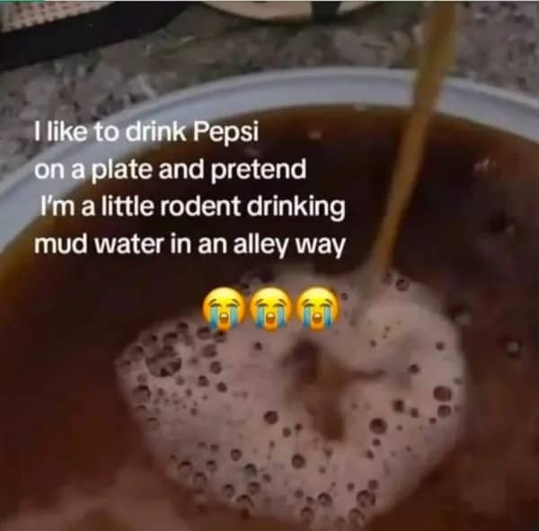 Pepsi soda being poured onto a white dinner plate to be drunk like water.