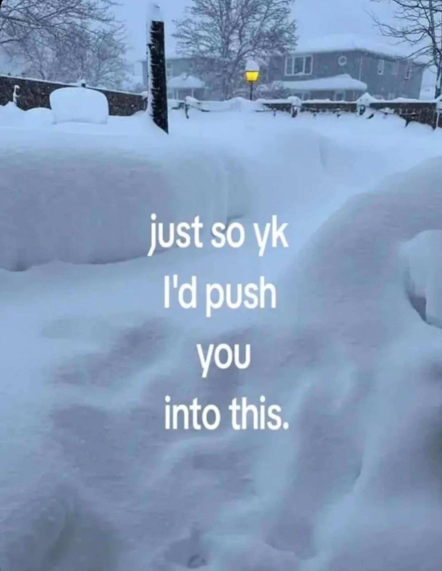 Deep winter snow drift with threatening text overlay about pushing someone.