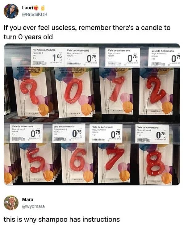 Red zero shaped birthday candle hanging on a store display shelf.