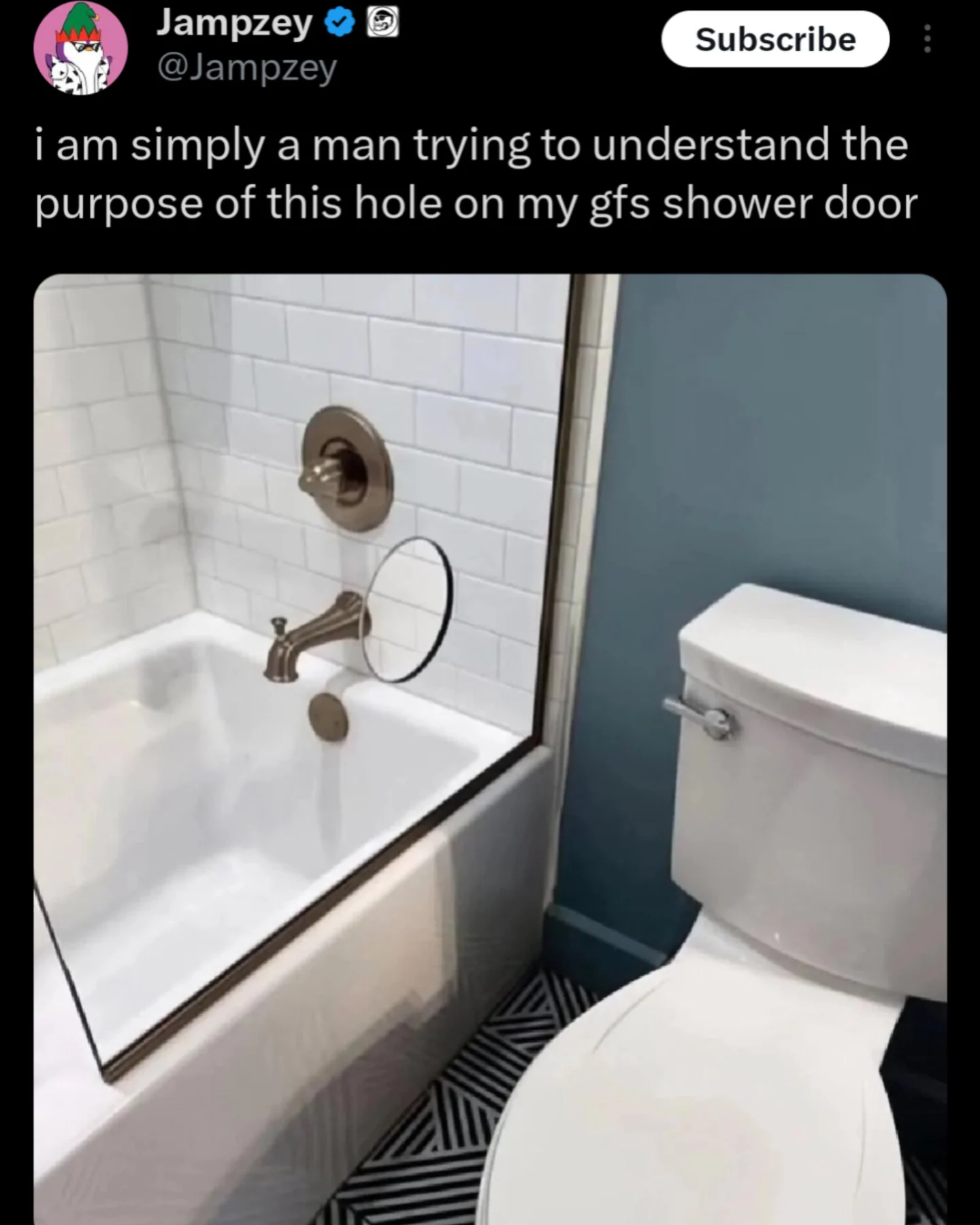 Bathroom shower glass door with a circular hole cut out to reach faucet handle.