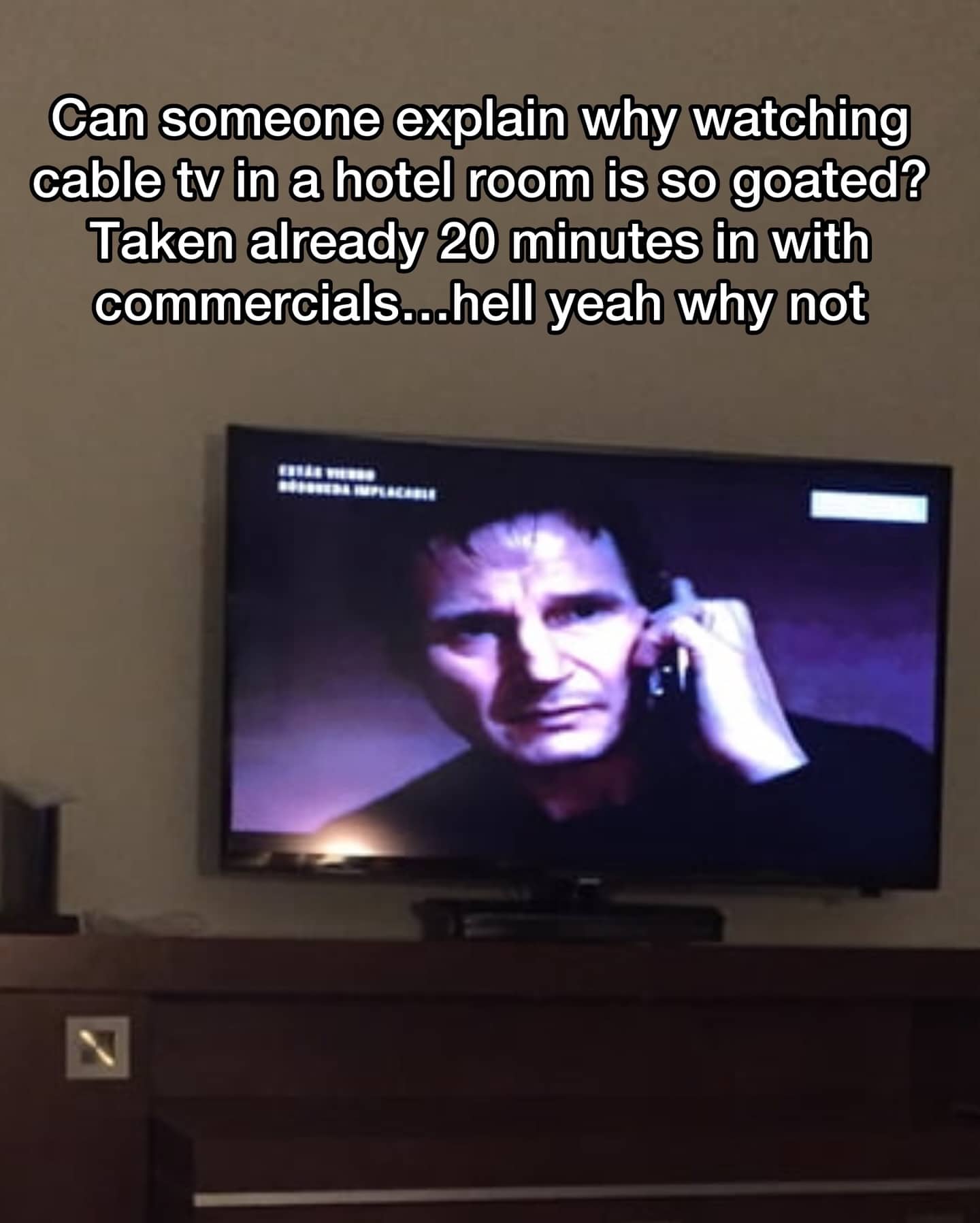 Meme about the joy of watching Liam Neeson movies on hotel cable TV.