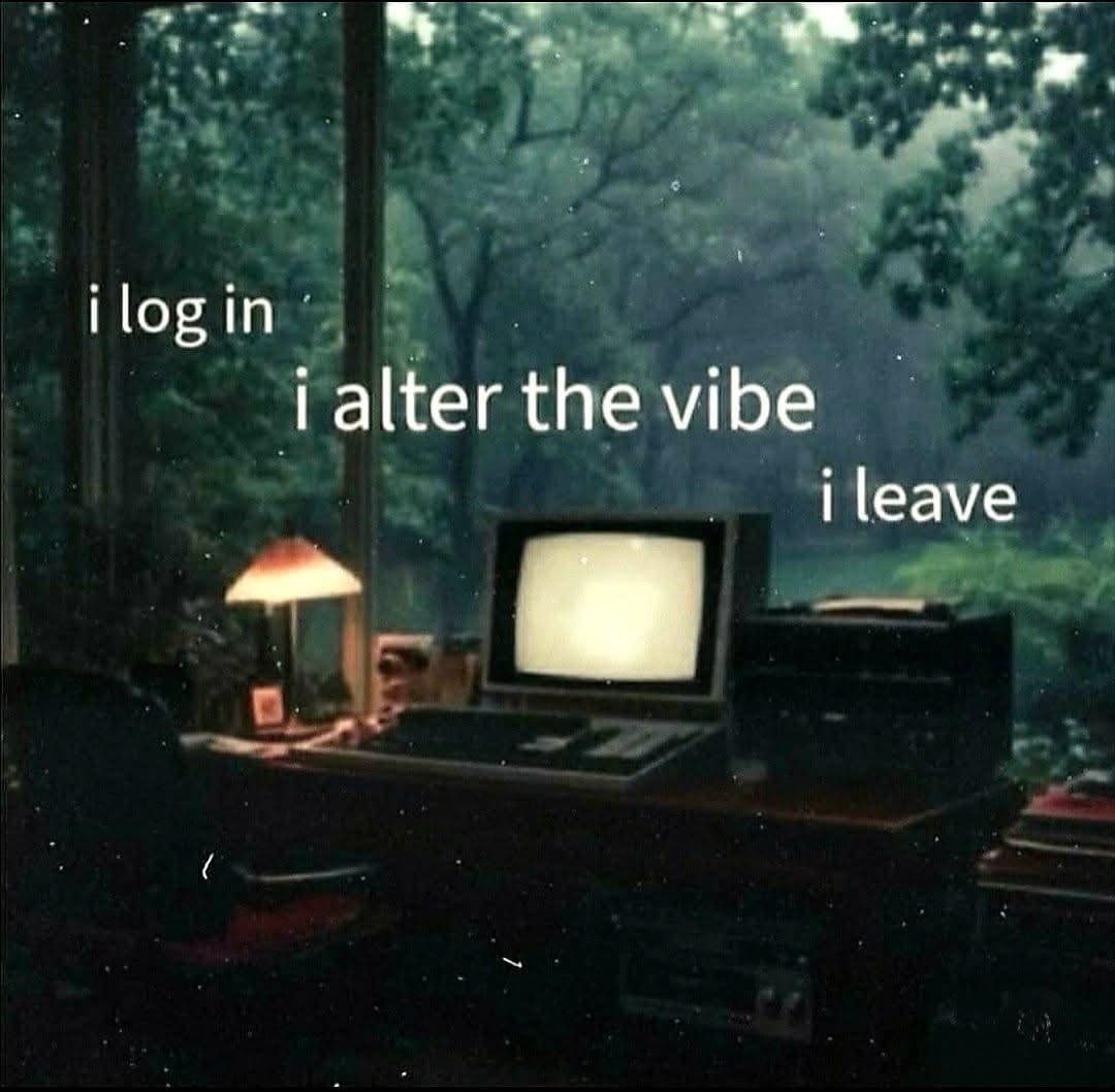 Retro computer setup in dark room with caption about altering the vibe funny pic.