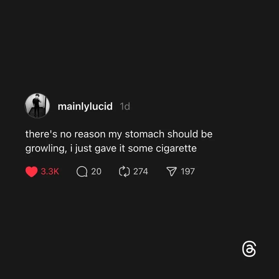 Tweet complaining about stomach growling after giving it a cigarette.