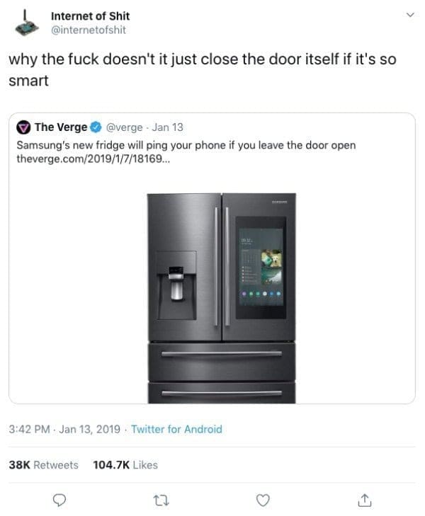 Tweet questioning why a smart Samsung fridge sends alerts instead of auto closing the door.