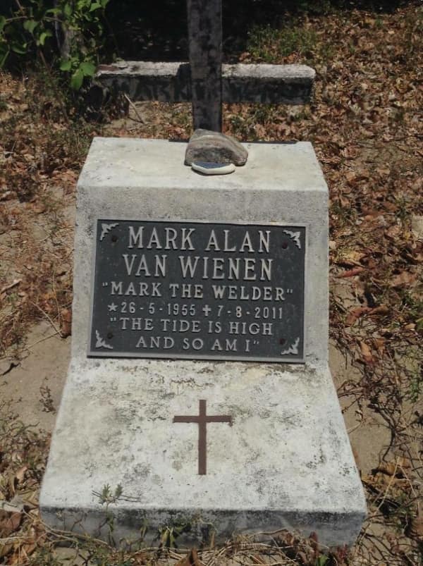 A funny tombstone for Mark the Welder with the quote "The tide is high and so am I".