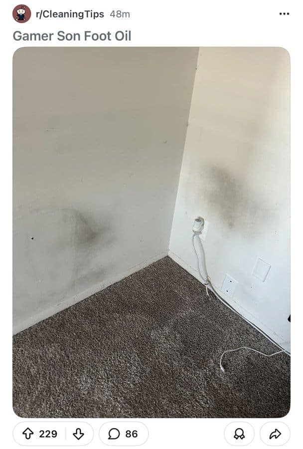 A gross gamer meme showing a wall stained with "foot oil" where a gamer rested their feet