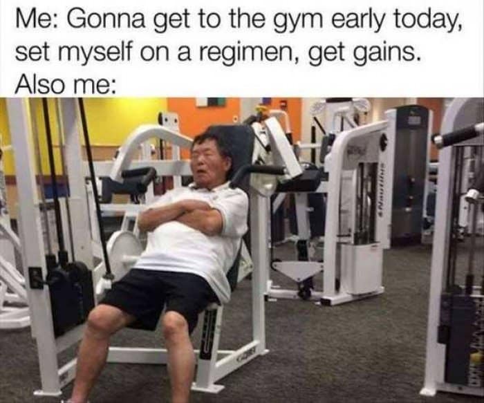 A gym meme of an older man asleep on a chest press machine captioned about morning workouts.