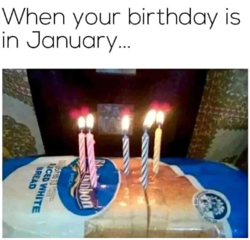 A funny photo of birthday candles stuck into a loaf of sliced bread for a January birthday.