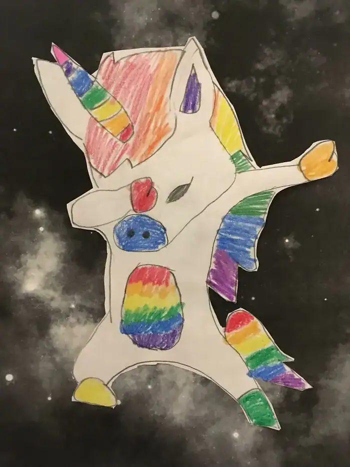 Colorful marker drawing of a unicorn dabbing in space background.