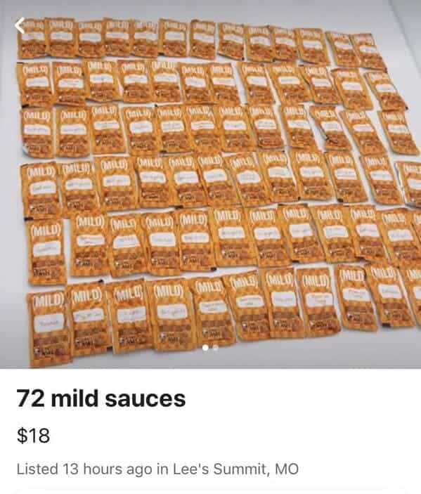 Array of seventy-two Taco Bell mild sauce packets arranged for sale online.