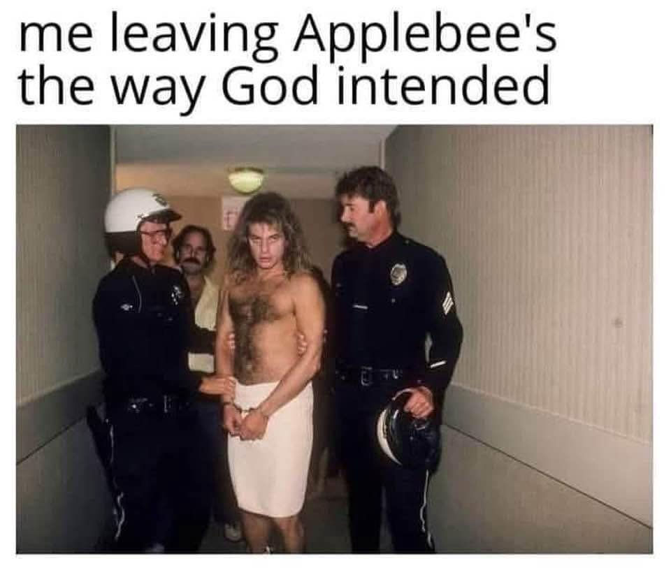 A hilarious meme of a man in a towel being arrested captioned me leaving Applebee's the way God intended.