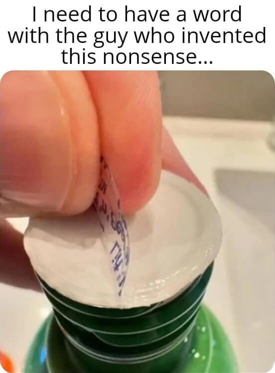 A funny meme photo of a hand unsuccessfully peeling a juice bottle seal, leaving the clear film behind.
