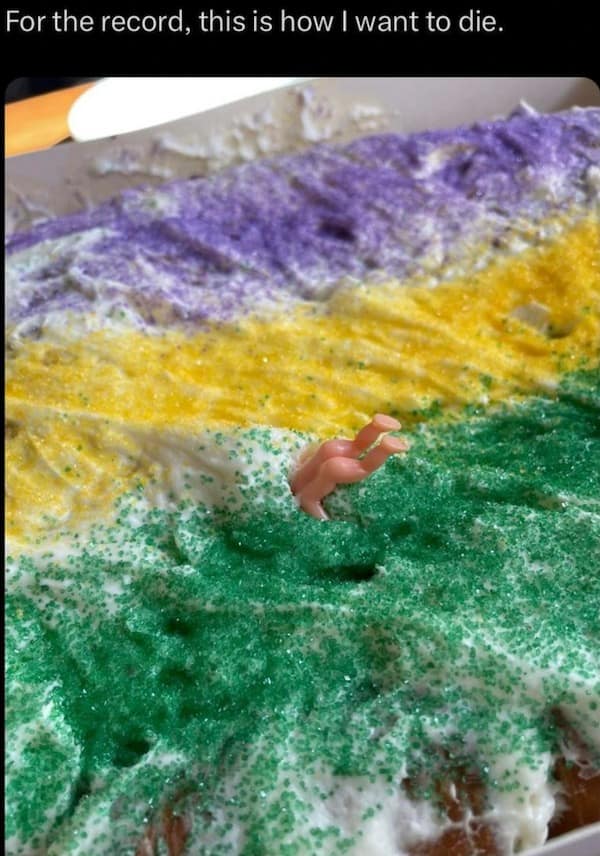 A funny meme of a King Cake with plastic baby legs sticking out, captioned "this is how I want to die."