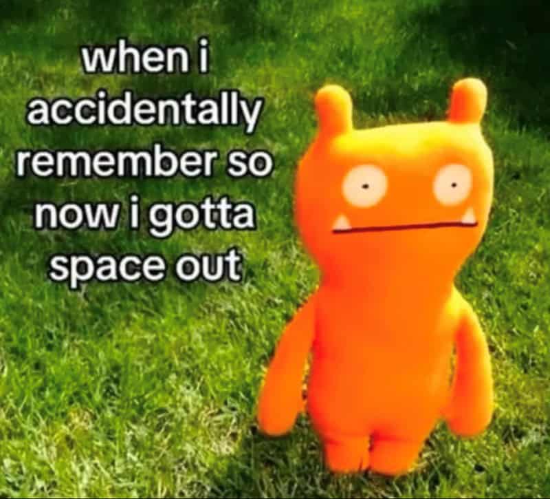 A mental health meme showing an orange plush toy staring blankly, representing dissociating after remembering something bad.