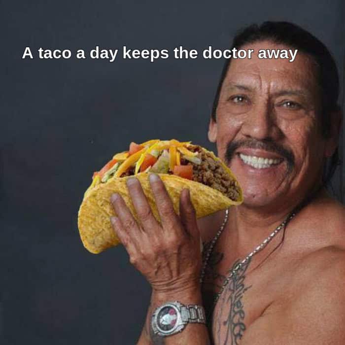 Danny Trejo holds a taco claiming it keeps the doctor away.