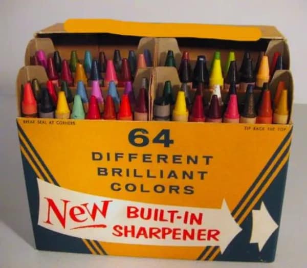 A photo of the classic Crayola 64 box with the built in sharpener on the back.