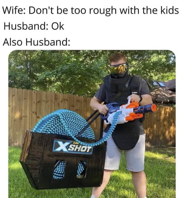 A funny parenting meme showing a dad holding a massive Nerf minigun after being told not to play rough.