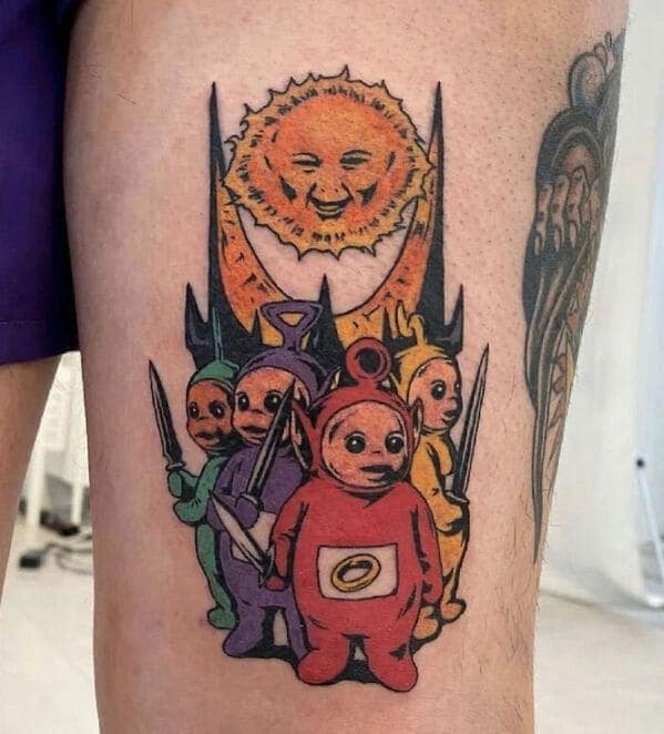 Evil Teletubbies holding weapons with dark sun baby tattoo questionable tattoos.
