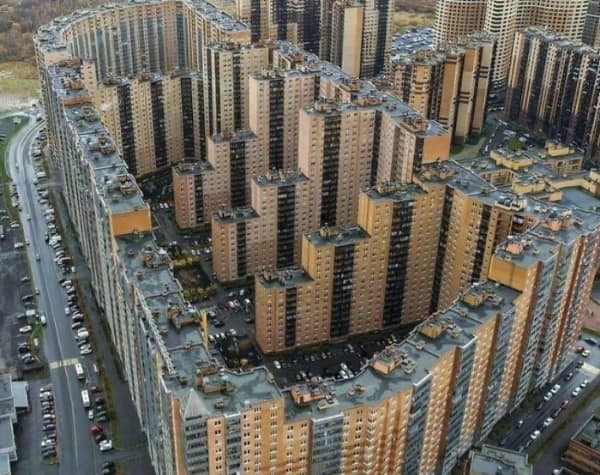 A massive, dense apartment complex block layout looking like a sinister building maze.