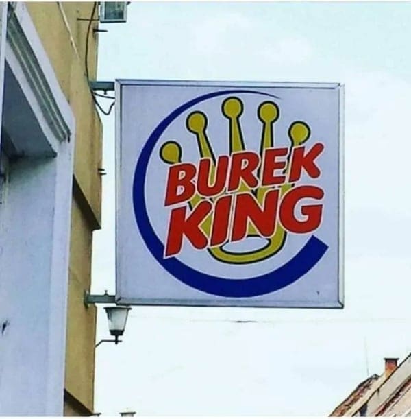 Burek King restaurant sign parodying the Burger King logo with a pastry crown.