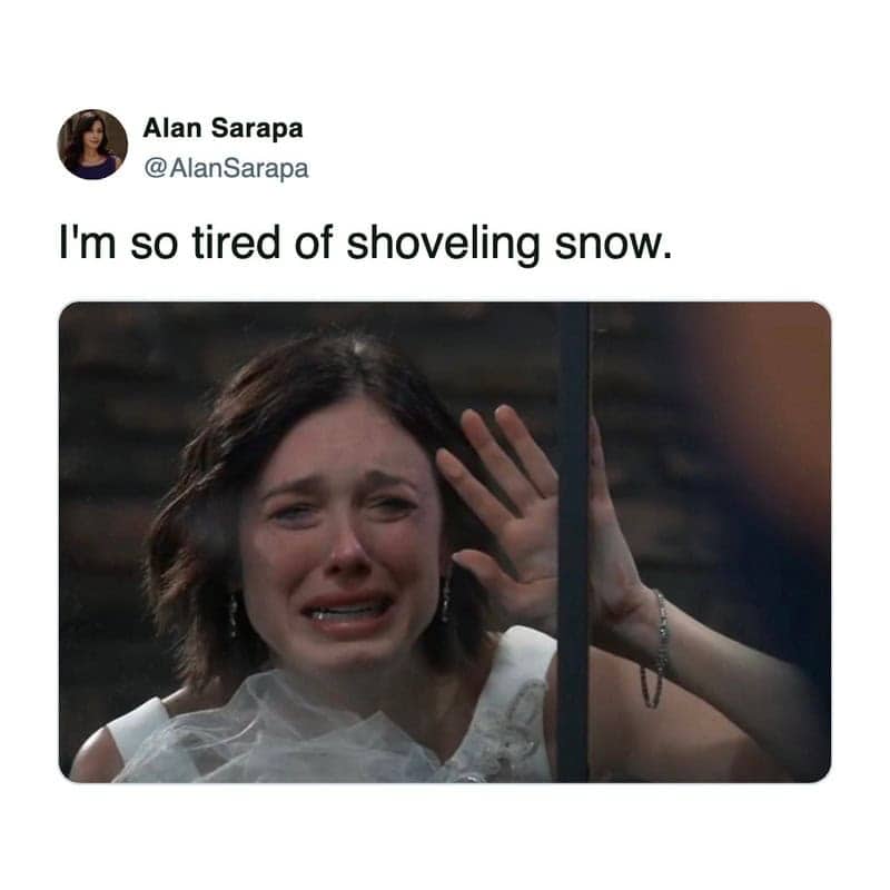 Crying woman pressed against glass tired of winter weather memes