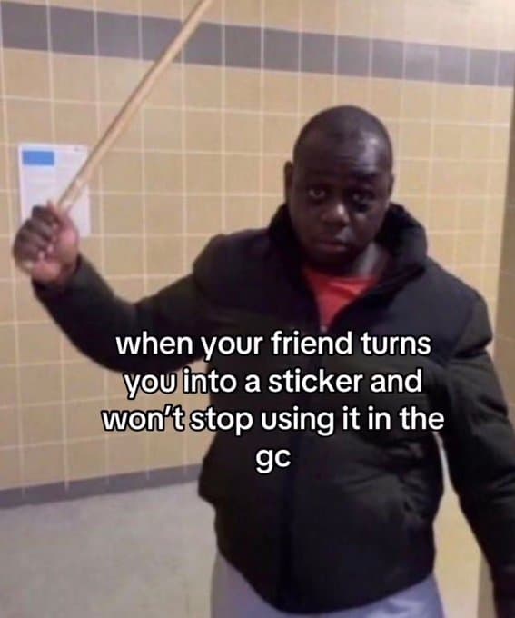 Blurry meme of a man with a stick reacting to being a group chat sticker.
