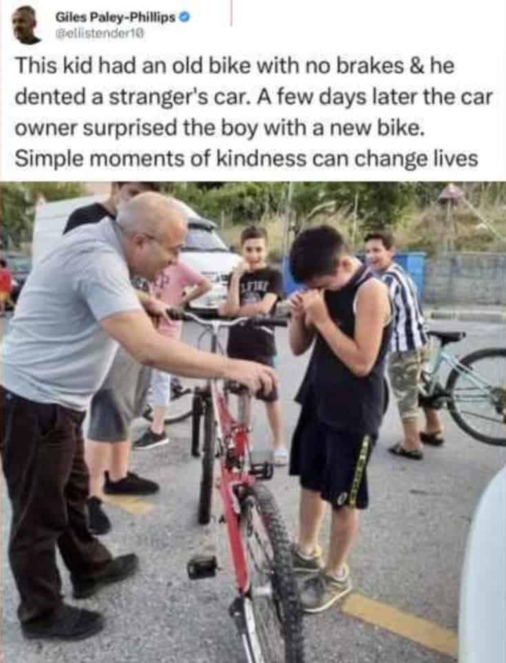 A wholesome meme photo showing a boy crying tears of joy after a car owner bought him a new bike.