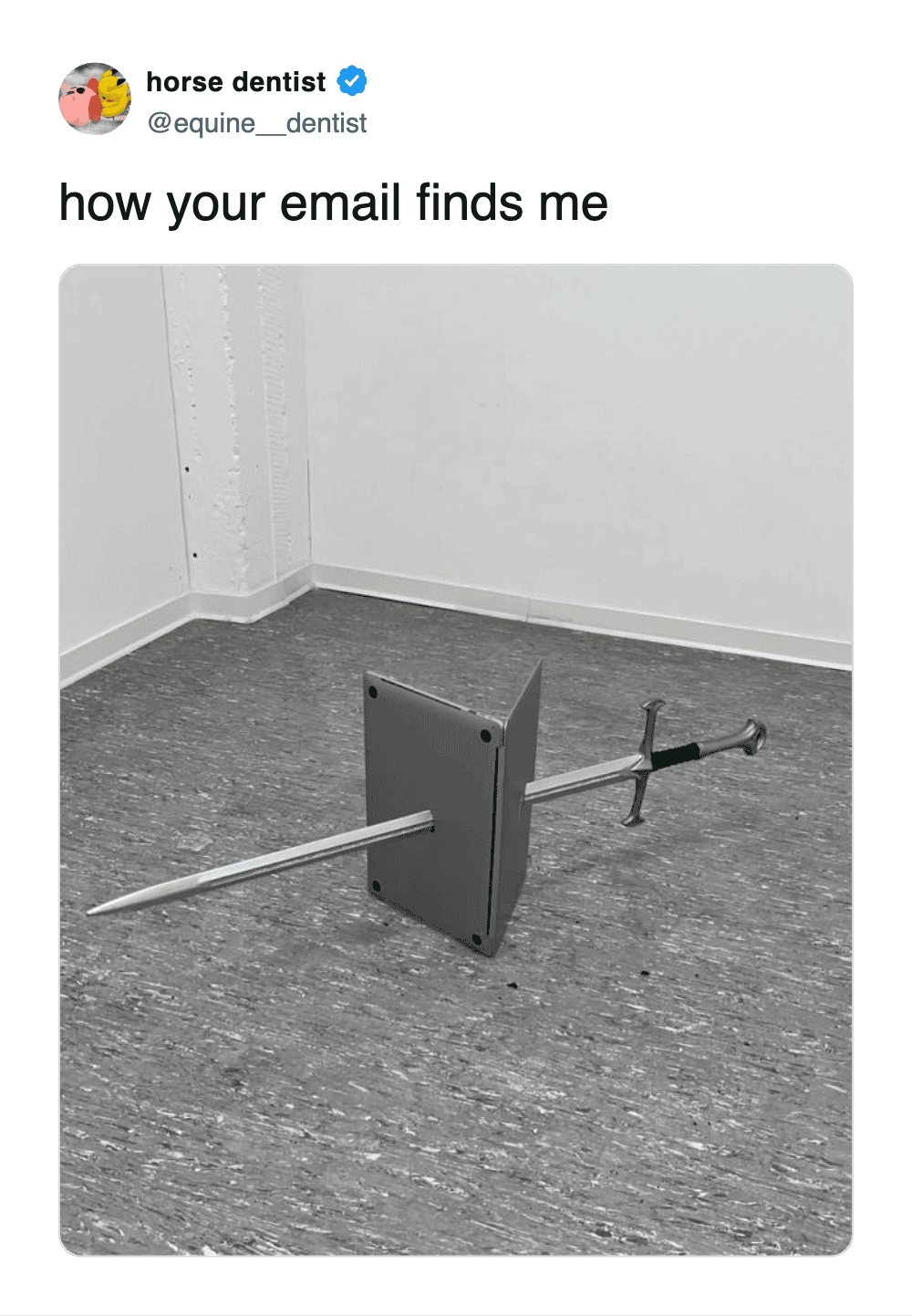 Laptop pinned to floor by medieval sword meme about hating emails.
