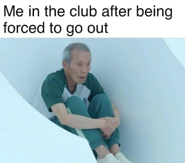 A classic meme using the old man Oh Il-nam from Squid Game sitting in a corner to represent being forced to go to a club.