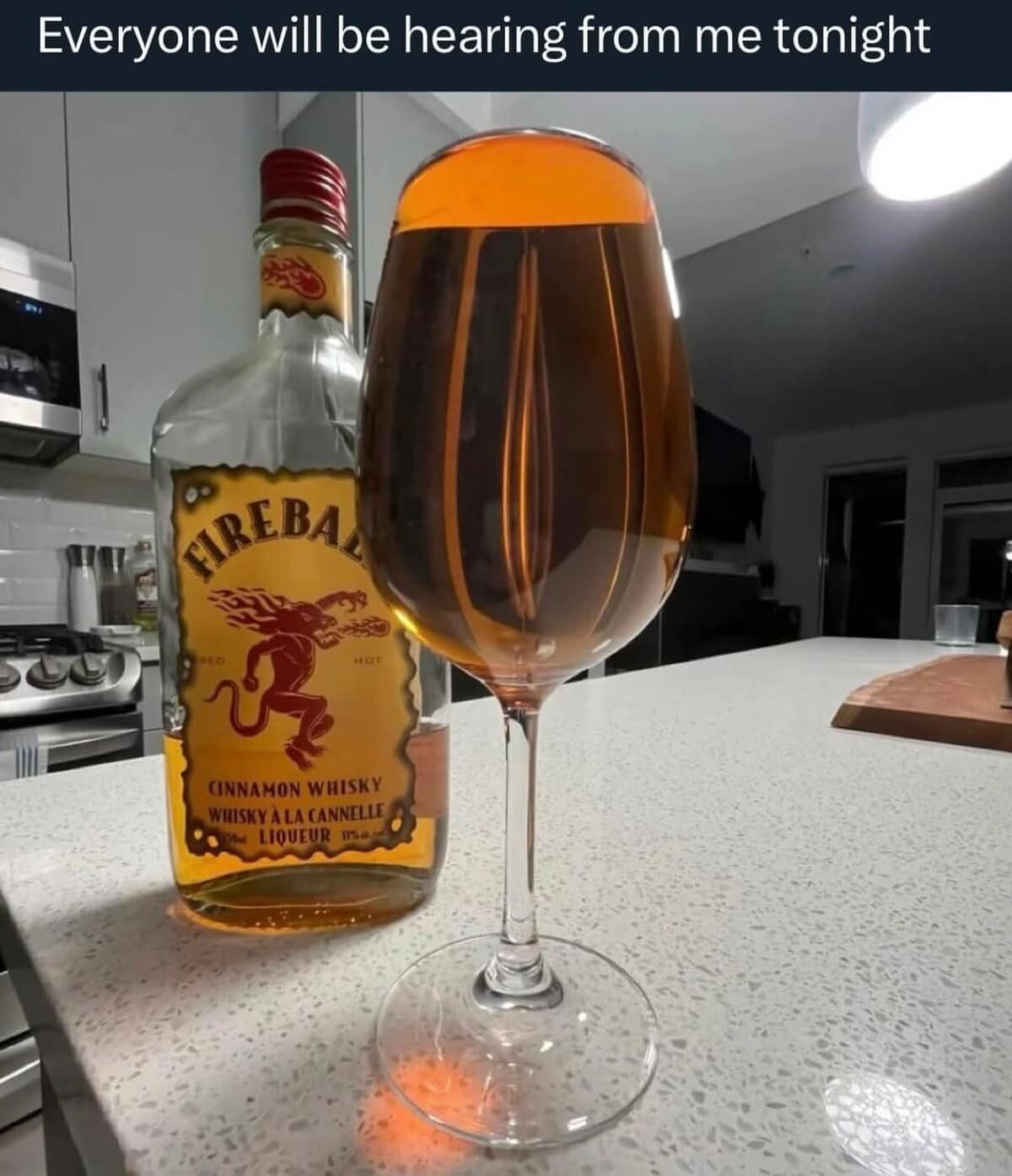 A classic meme showing a bottle of Fireball whisky poured into a large wine glass, captioned "Everyone will be hearing from me tonight."