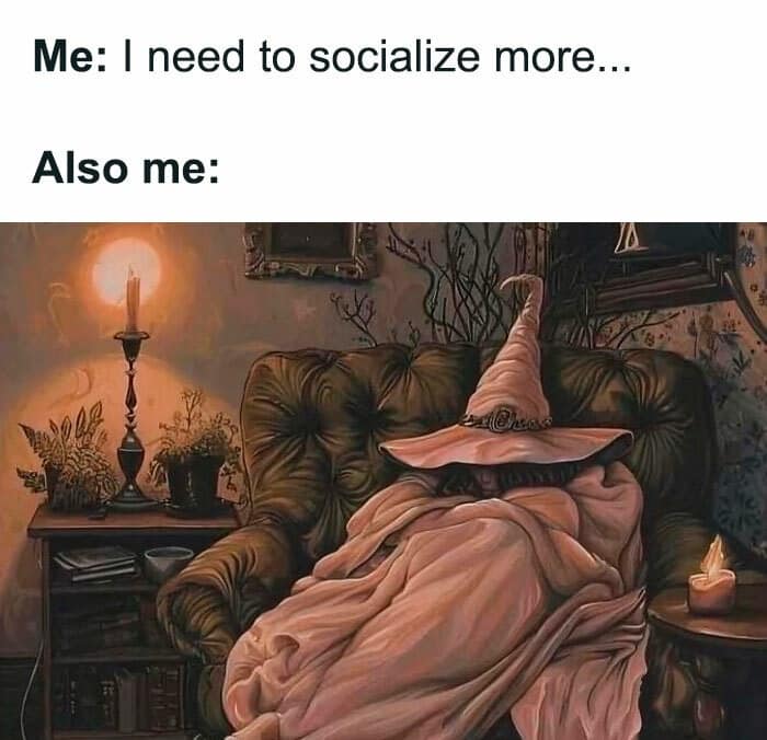 A deeply relatable introvert vintage meme illustrating the desire to socialize immediately followed by the reality of staying home, depicting a completely hidden wizard slumped in a cozy armchair entirely covered by a pink blanket.