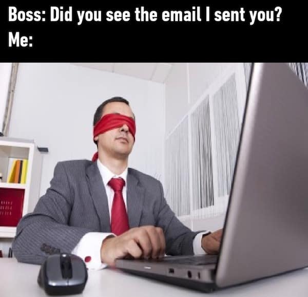 Stock photo of a businessman wearing a red blindfold answering a boss about an email classic meme.