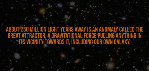 A cosmic spooky fact set against a deep space background, explaining the existential dread of the "Great Attractor," a massive, unseen gravitational anomaly 250 million light years away that is currently pulling our entire galaxy towards it.