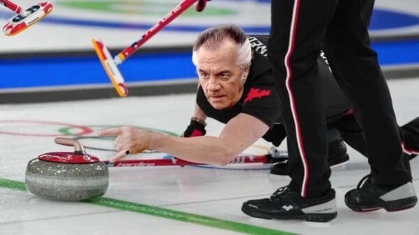 A Sopranos themed Canadian curling controversy meme featuring Paulie Walnuts using his signature "two fingers" gesture to point at the stone with mobster attitude.