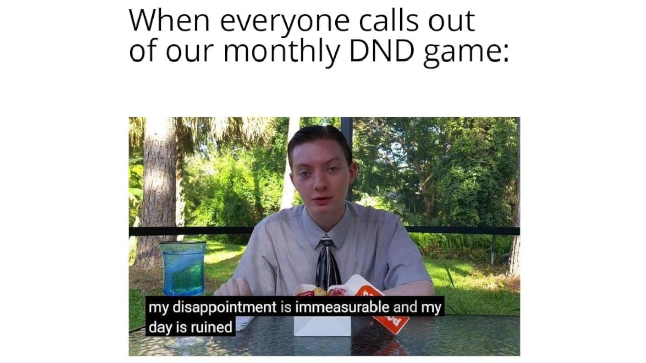 Disappointed Reviewbrah sitting at a table. Captures the immense pain of players canceling a monthly tabletop campaign.