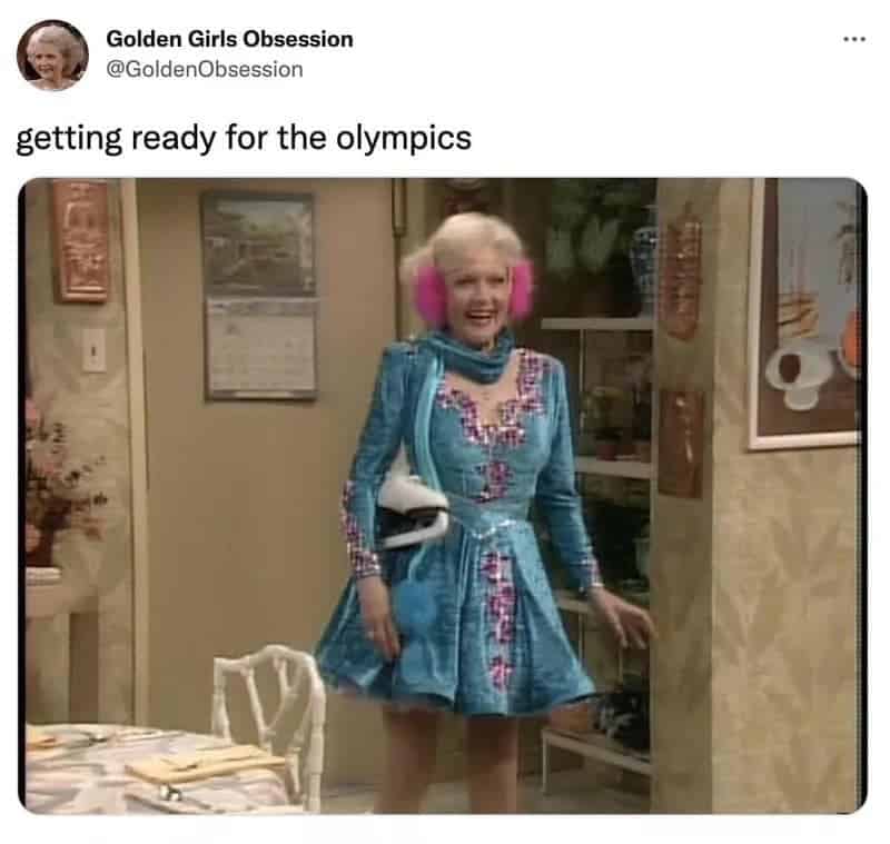 A figure skating meme featuring Betty White in a blue sparkly dress and pink earmuffs captioned "getting ready for the olympics."