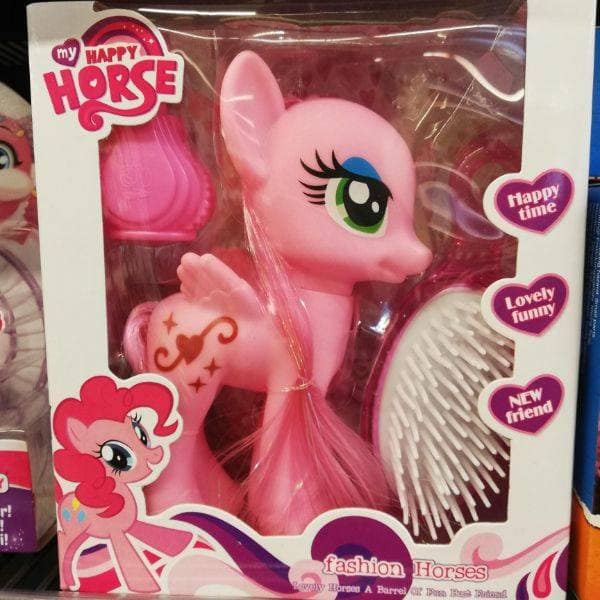 My Happy Horse toy in a pink box ripping off the My Little Pony franchise. Bootleg children toys found at a discount store.