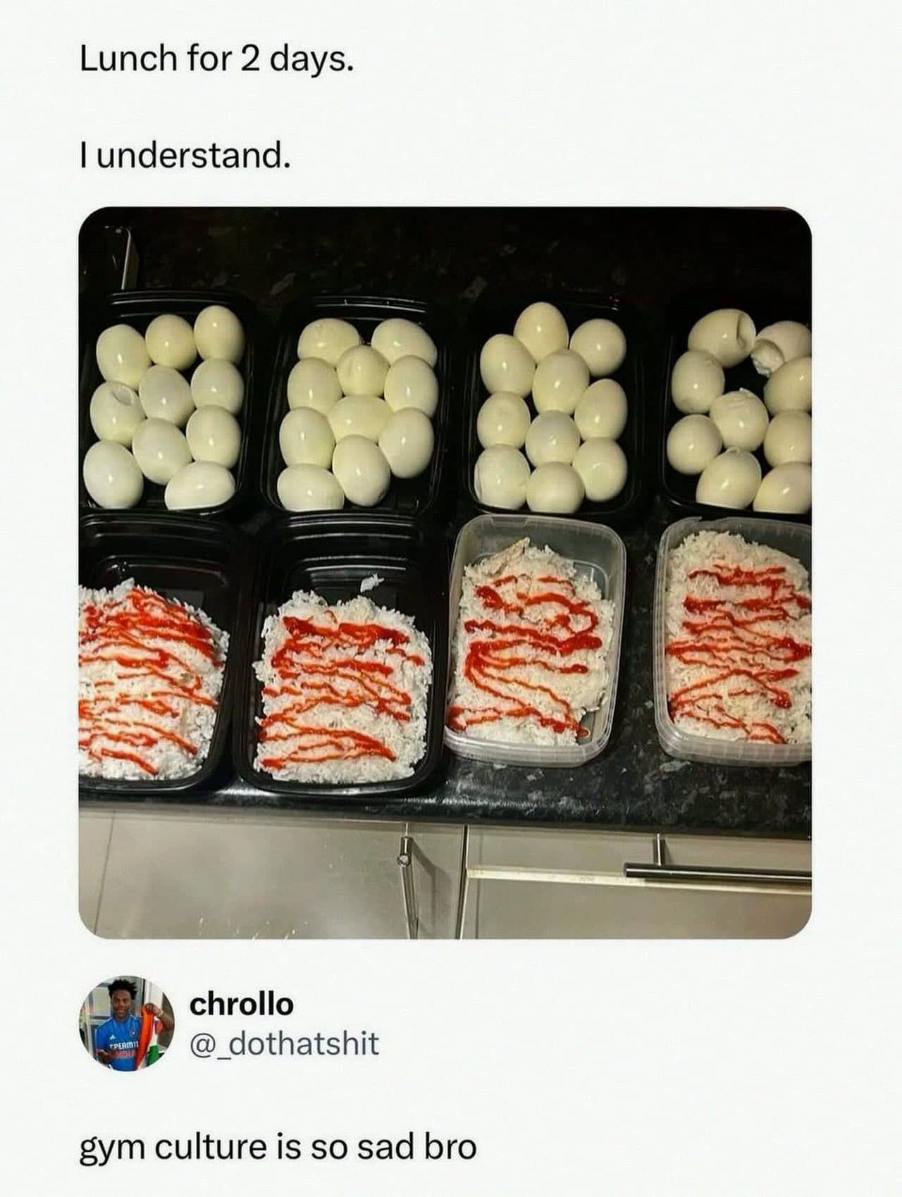 Eight meal prep containers filled with dozens of hard-boiled eggs and white rice with sriracha.