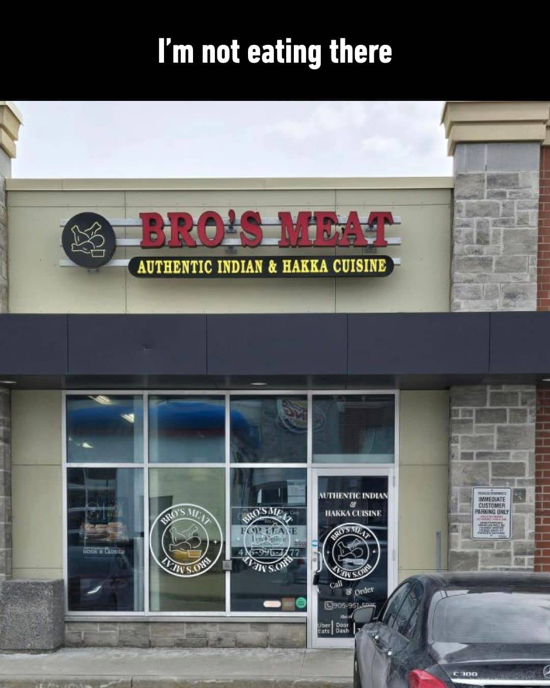 Unfortunate restaurant signage for Bro's Meat authentic Indian and Hakka cuisine with funny caption.