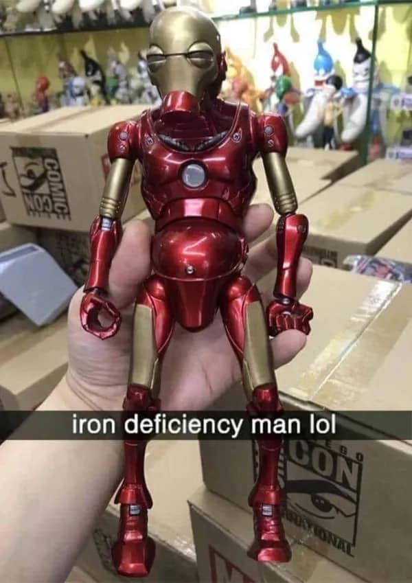 A funny custom action figure labeled "iron deficiency man" featuring a thin, drooping Iron Man suit.
