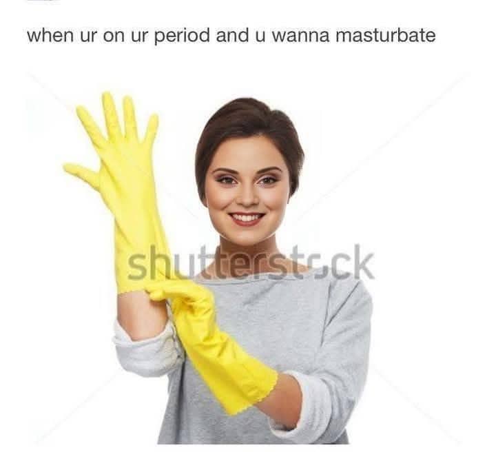 Stock photo of a woman wearing yellow rubber gloves with a humorous period-related caption.