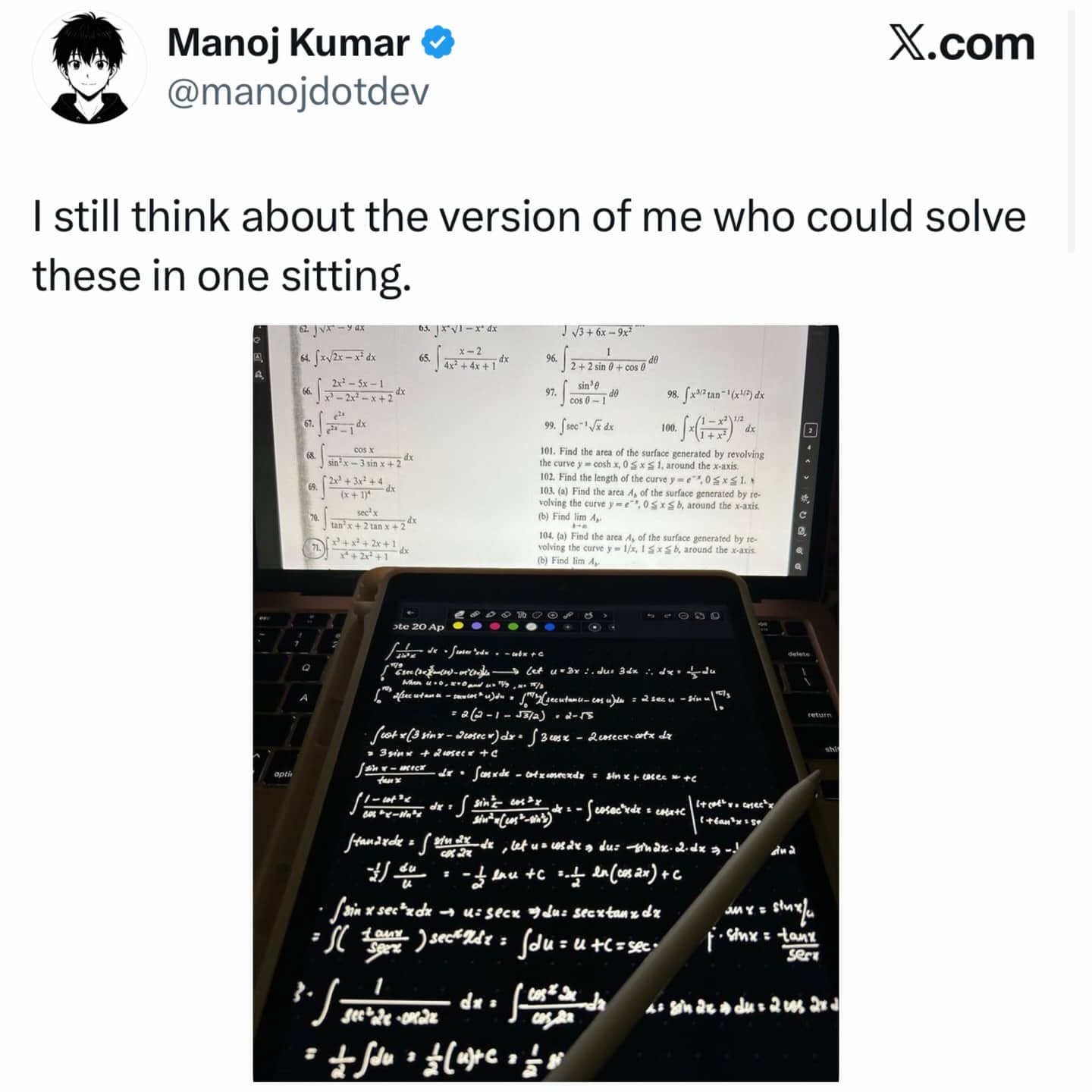 A laptop screen showing complex calculus problems next to an iPad with handwritten math solutions.
