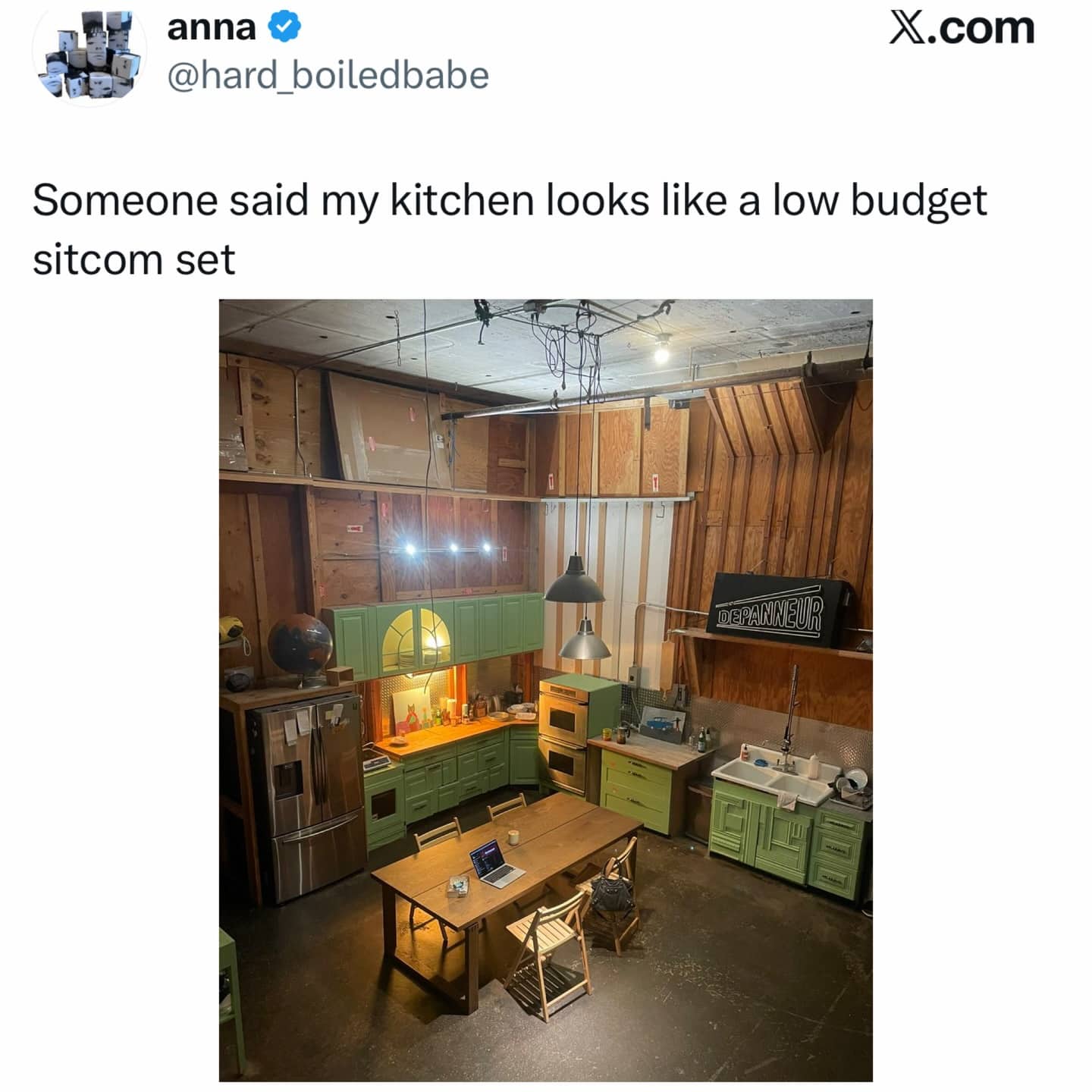 Bird's eye view of a kitchen that looks exactly like a low-budget sitcom stage set. Would you like me to process the next batch of 10 images for you?