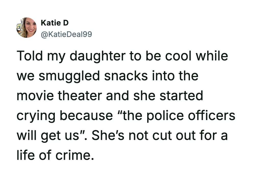 A funny parenting tweet by Katie D about her daughter crying because she thought "the police officers will get us" for sneaking snacks into a movie.