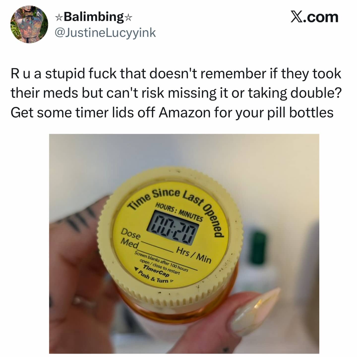 A helpful funny photo of a pill bottle with a timer lid to track medication doses.