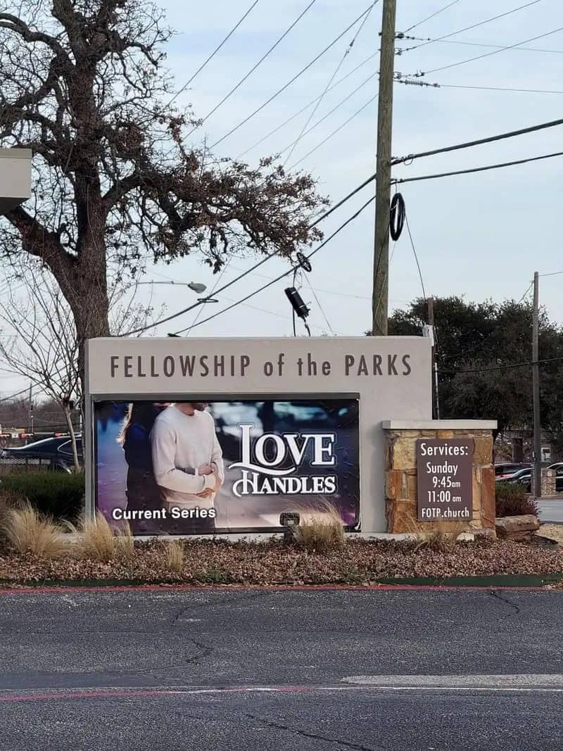 A funny church sign for a series titled "Love Handles" featuring a couple holding hands.