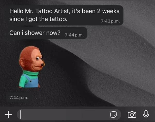 Message to a tattoo artist asking if it is okay to shower after two weeks.