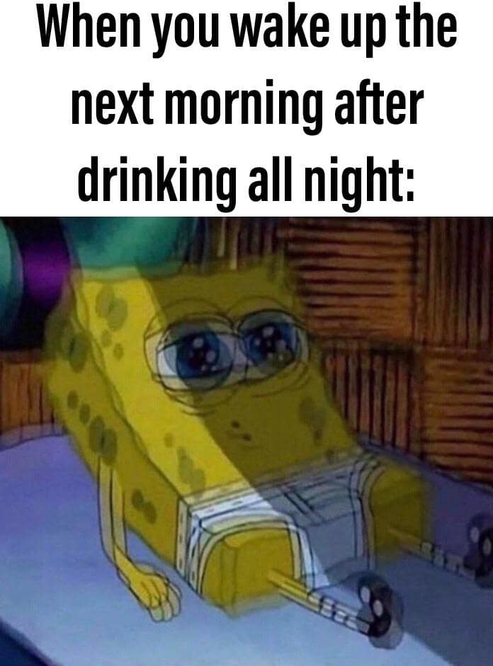 Spongebob Squarepants sitting in bed looking transparent and traumatized. A classic reaction to waking up after drinking.