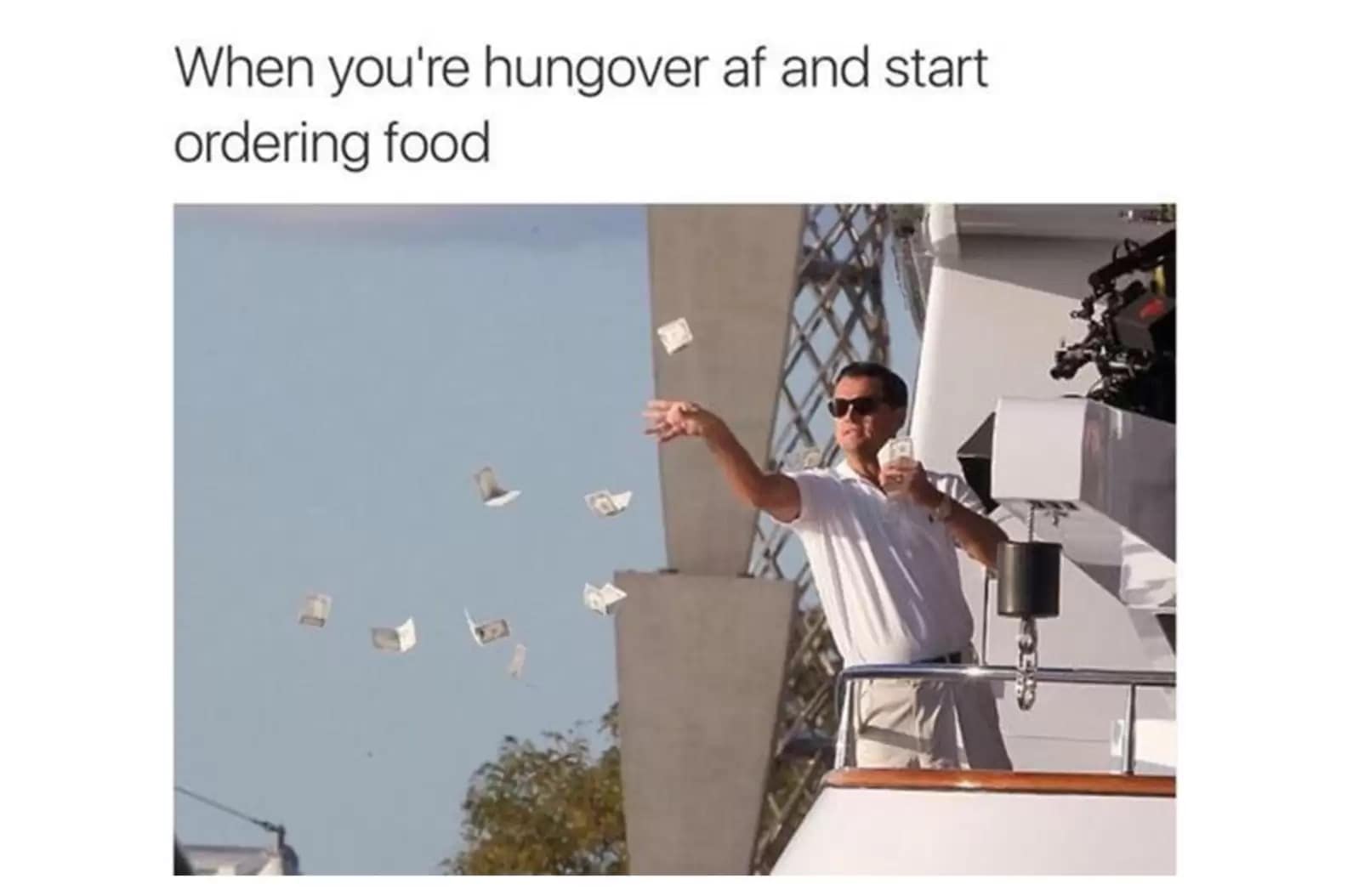 Leonardo DiCaprio throwing money off a yacht. Relatable hangover memes about recklessly spending cash on delivery food.